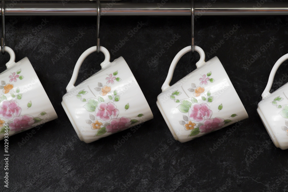 Tea cups on the kitchen wall Tea cups on the kitchen wall