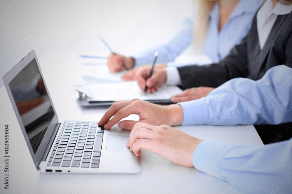 Group of business people working together in office Group of business people working together in office