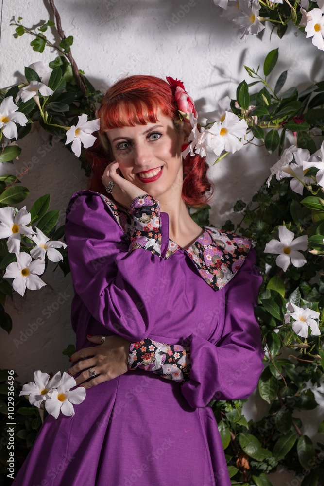 young redhead girl on a retro vintage dress