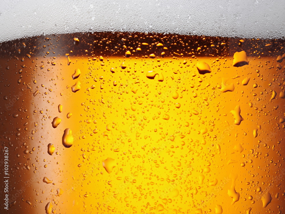 Water drops on glass of beer. Close up. Water drops on glass of beer. Close up.