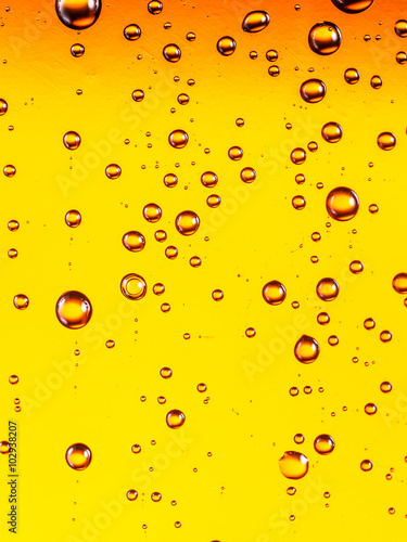 Water drops on glass of beer. Close up.