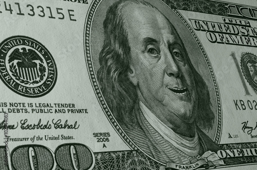 Ben Franklin Smiling on Hundred Dollar Bill