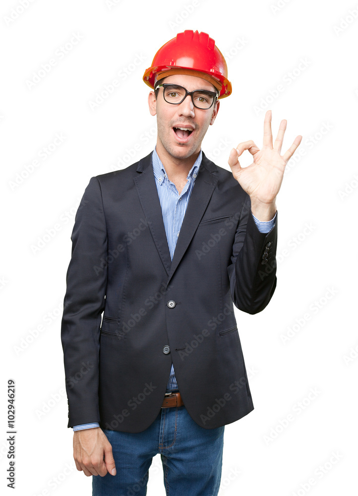 Happy young architect with all right gesture Happy young architect with all right gesture