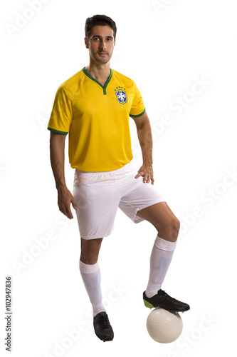 Brazilian soccer player, celebrating on a white background. © paulovilela