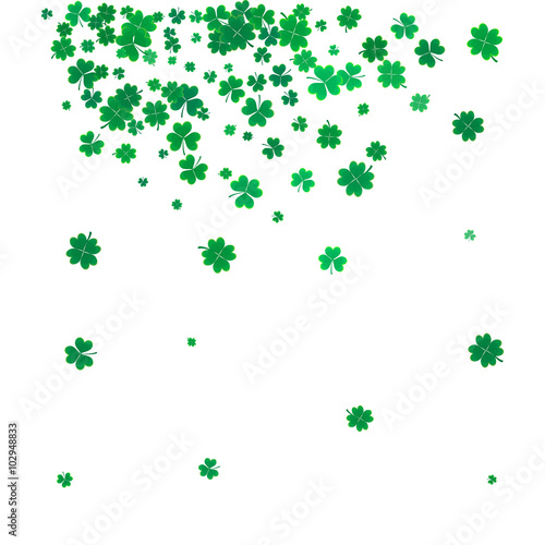 St. Patricks day background with flying clovers.
