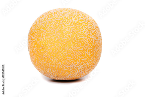 Close up view of a honeydew melon isolated on a white background.