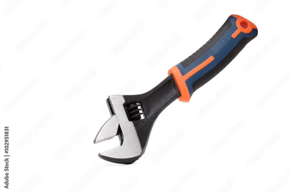 Close up view of an adjustable wrench isolated on a white background. Close up view of an adjustable wrench isolated on a white background.