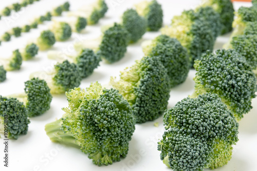 Close view of a bunch of broccoli vegetables aligned in a perfect way.