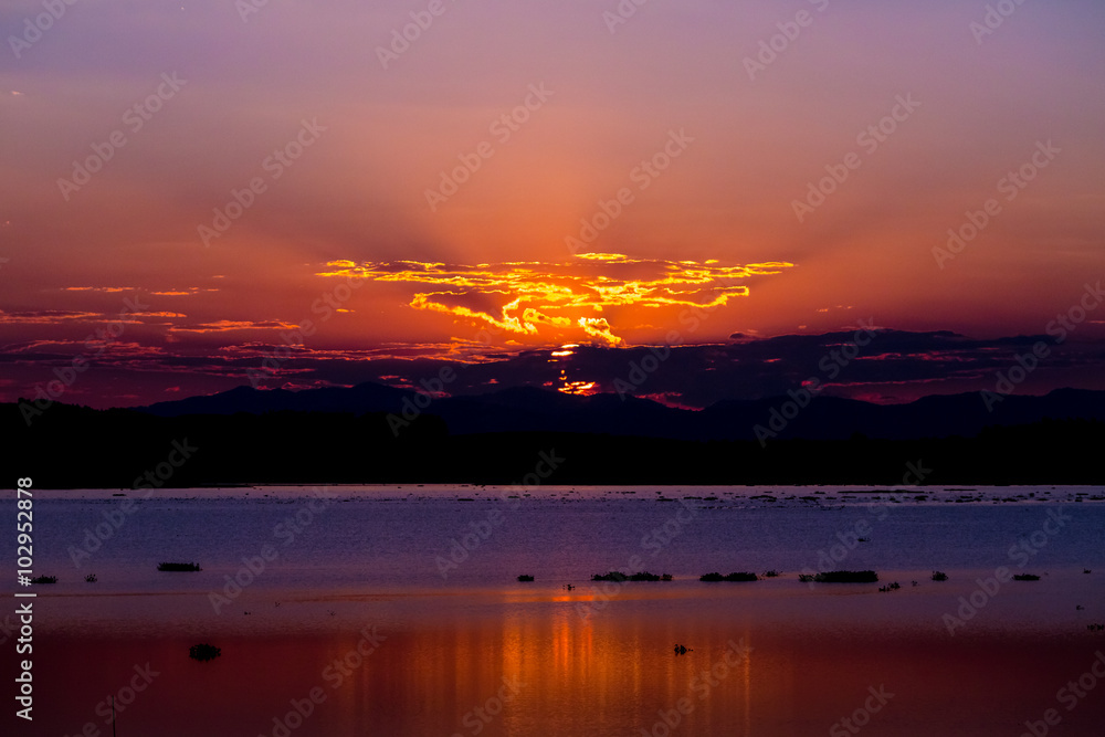 Scenic view of beautiful sunset over lake.