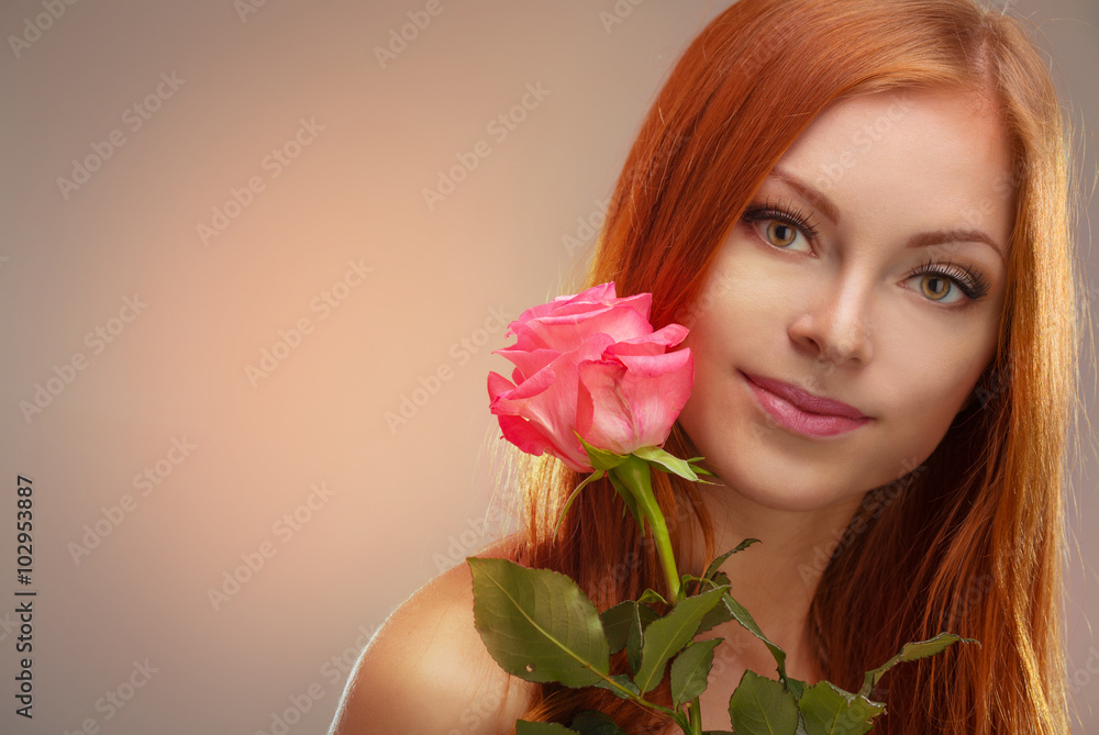 Fototapeta premium Beautiful young red-haired girl