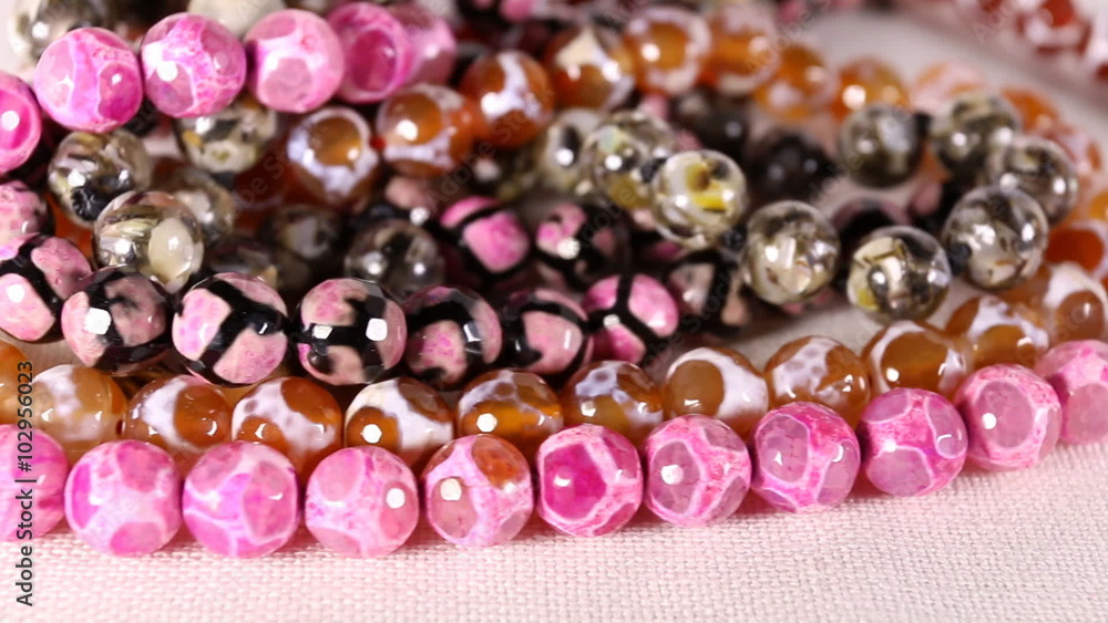 Beads jewelery as fashion background. Macro shot. Beads jewelery as fashion background. Macro shot.
