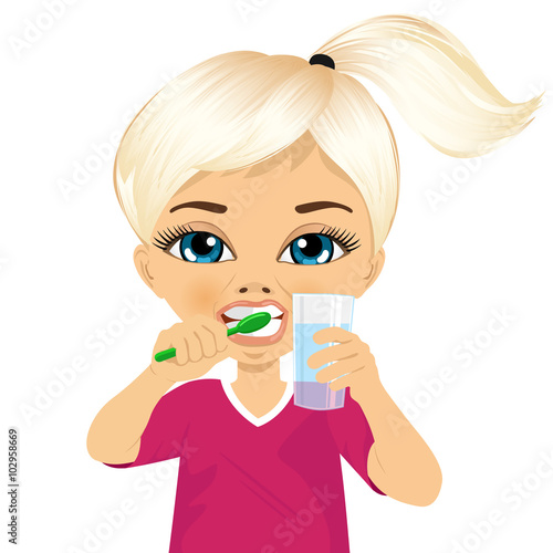 Cute little girl brushing teeth