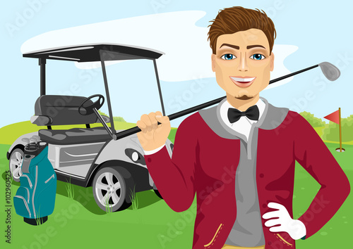 Portrait of handsome male golfer with golf club