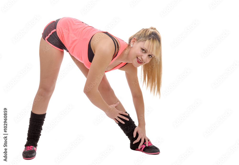 beautiful young sportswoman doing stretching exercises. isolated beautiful young sportswoman doing stretching exercises. isolated