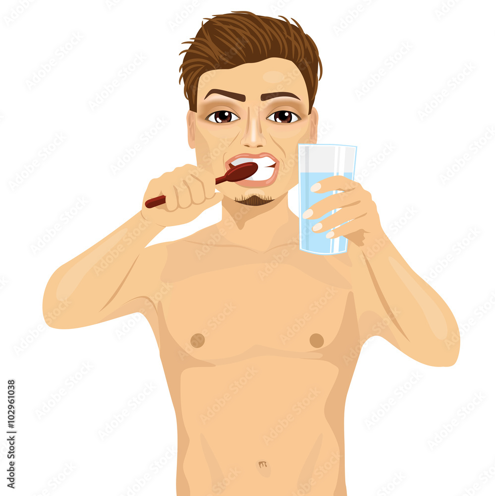Young handsome man brushing his teeth Young handsome man brushing his teeth