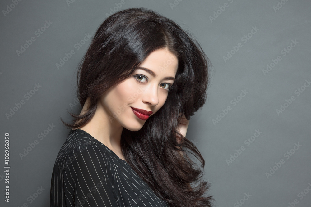 Fashion model woman with dark red lips in studio Fashion model woman with dark red lips in studio