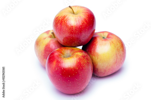 apples in a basket on white background