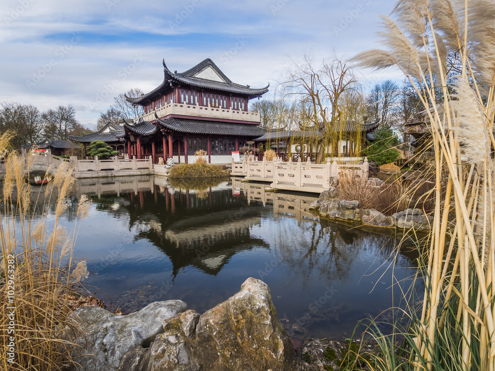 lake in front of a japanese style house