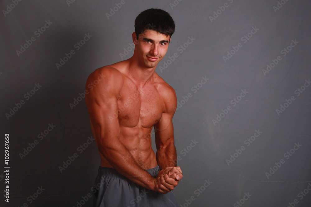 Fototapeta premium Athlete looks into the camera