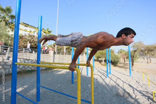 Athlete makes planche
