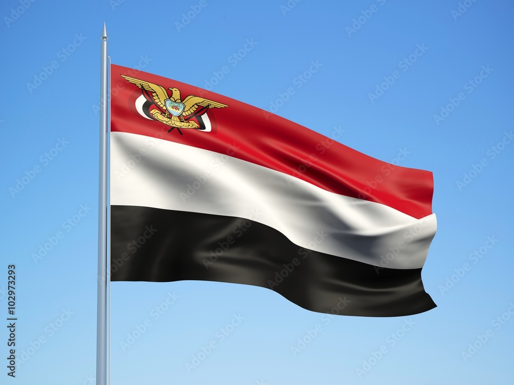 Naklejka premium Yemen 3d flag floating in the wind with a blue sky background