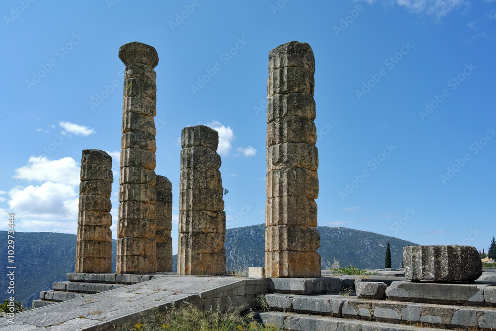 Cloudscape with The Temple of Apollo in Ancient Greek archaeological site of Delphi,Central Greece