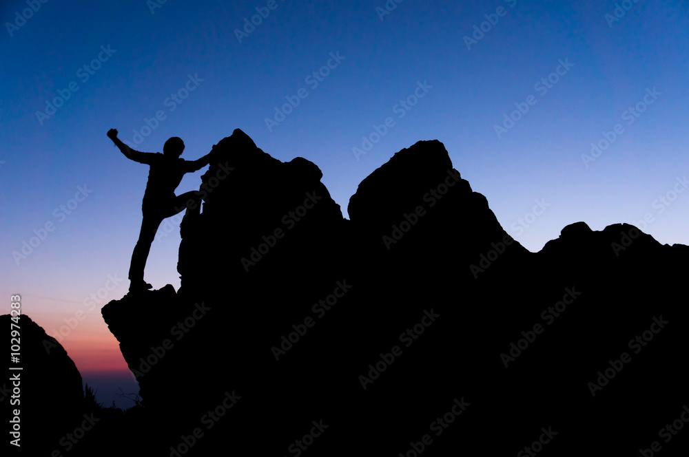 Silhouette of the person and sunset gradient background. Active sport and business goal life.