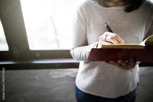Asian Lady Writing Notebook Diary Concept