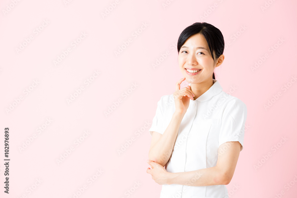 portrait of asian nurse isolated on pink background portrait of asian nurse isolated on pink background