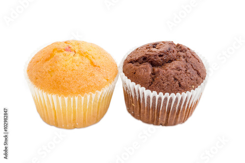 Two various sweet muffins on a light background