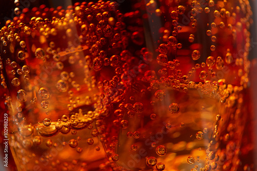 cola with ice closeup