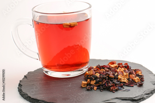 Still life, aromatic dry tea with fruits and petals