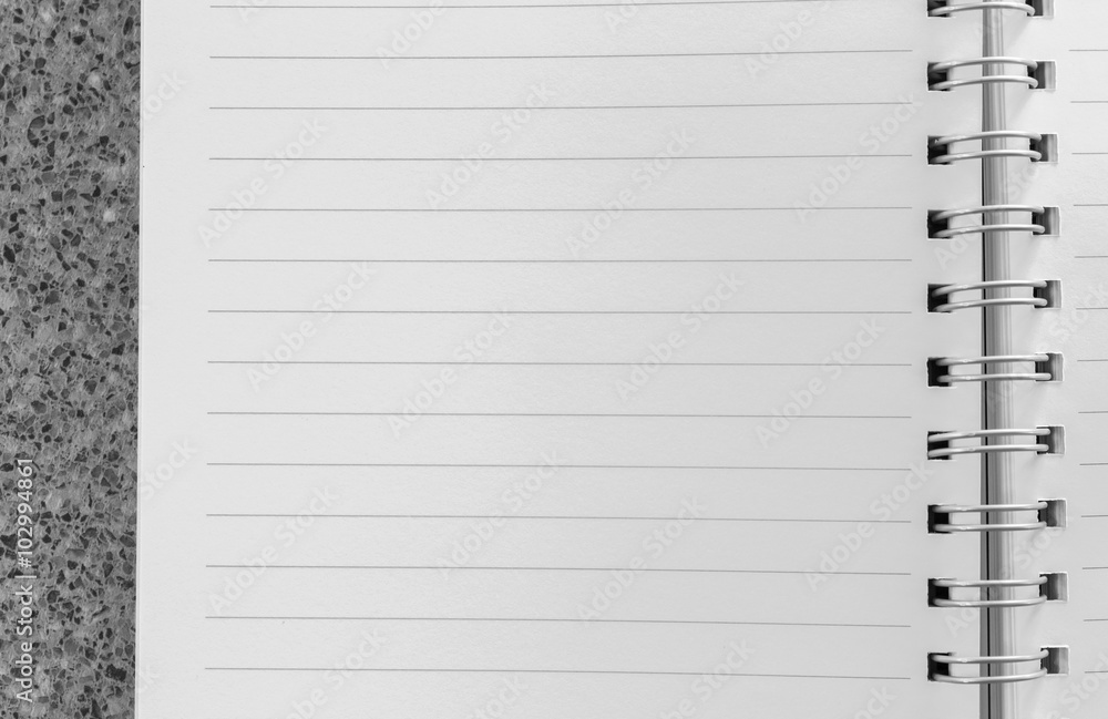 Open notebook on table background Open notebook on table background
