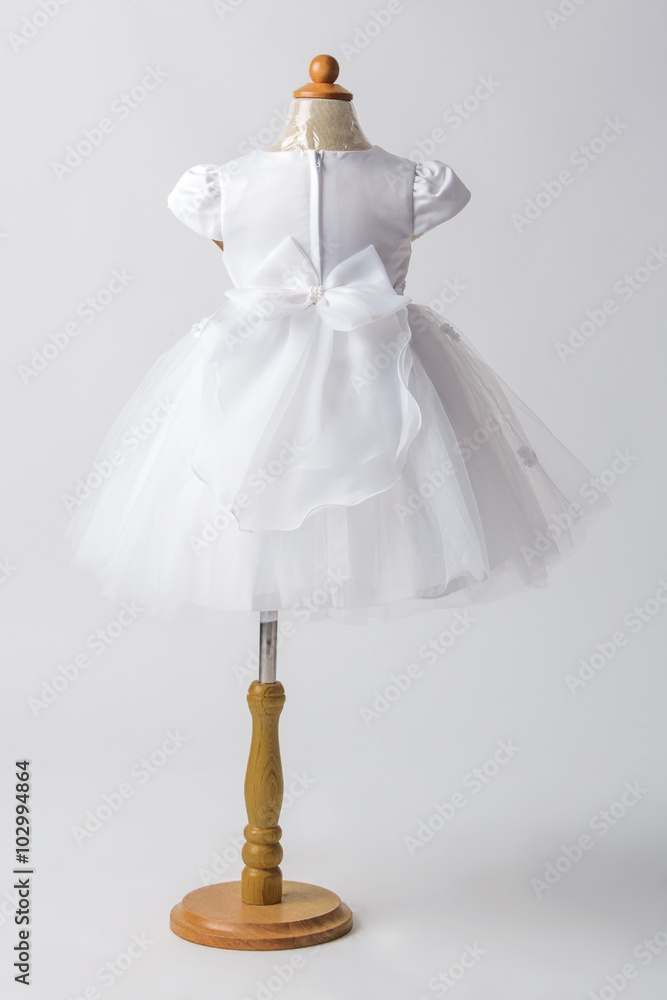 Baby white dress on a mannequin Baby white dress on a mannequin