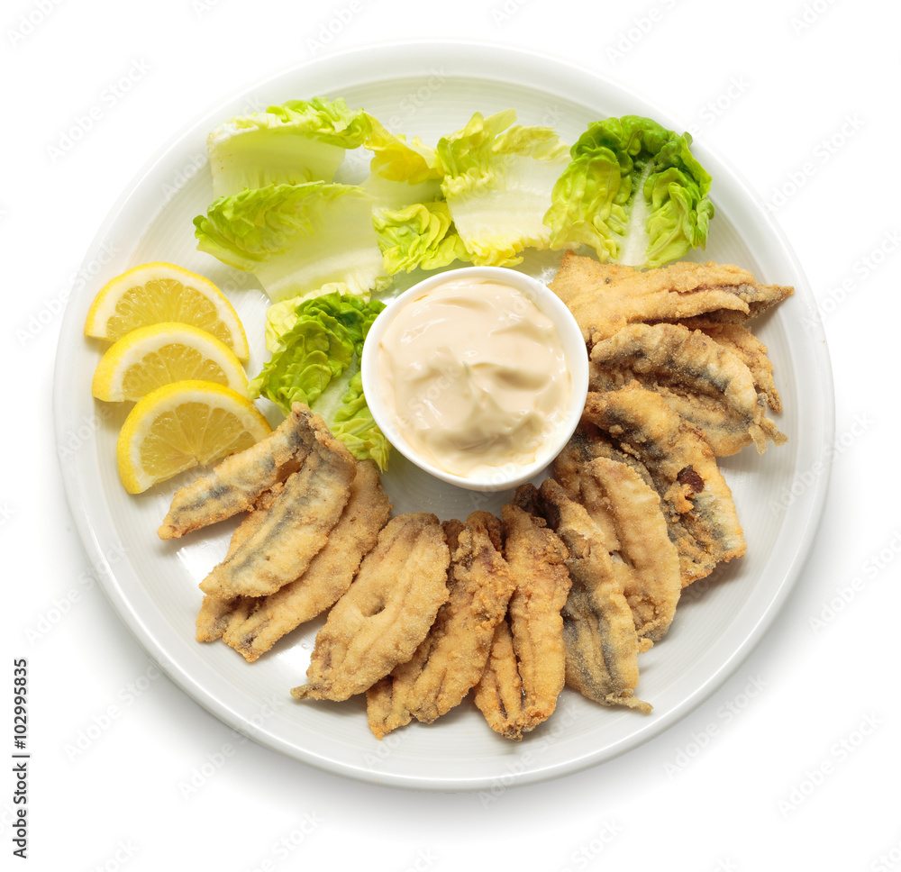 Fried anchovies with salad and mayonnaise Fried anchovies with salad and mayonnaise