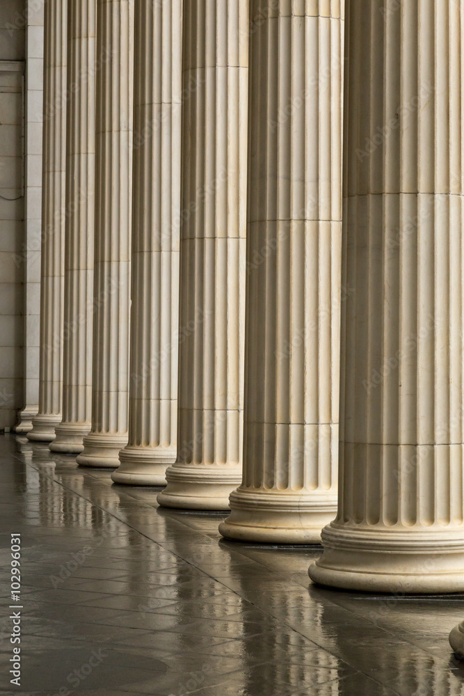 Many old greek columns with reflection Many old greek columns with reflection