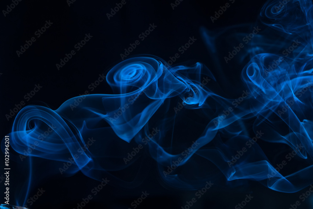 Blue smoke on black background Blue smoke on black background