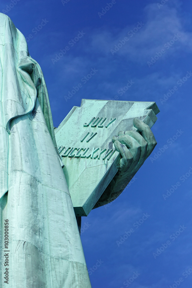 Close up of the tablet of Statue of Liberty Stock Photo Adobe Stock