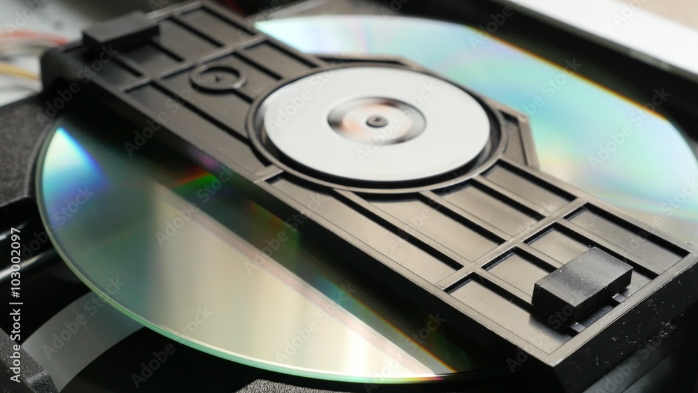 Compact disc reading mechanism inserting media 4K 2160p UltraHD footage - DVD and CD player disc reading mechanism sequence 4K 3840X2160 UHD video Compact disc reading mechanism inserting media 4K 2160p UltraHD footage - DVD and CD player disc reading mechanism sequence 4K 3840X2160 UHD video