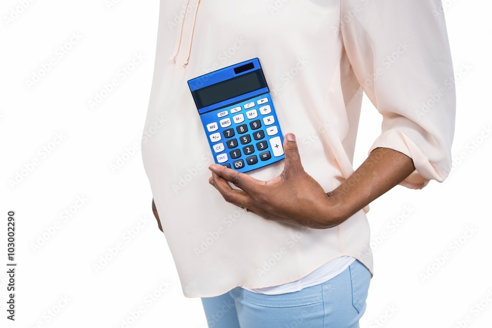 Pregnant woman holding calculator Pregnant woman holding calculator