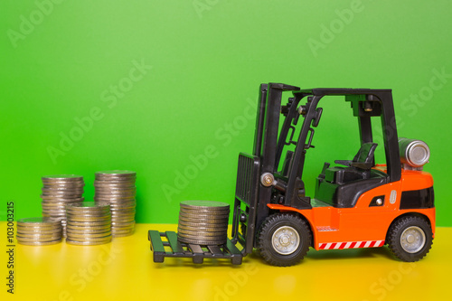 Forklift truck delivering coins