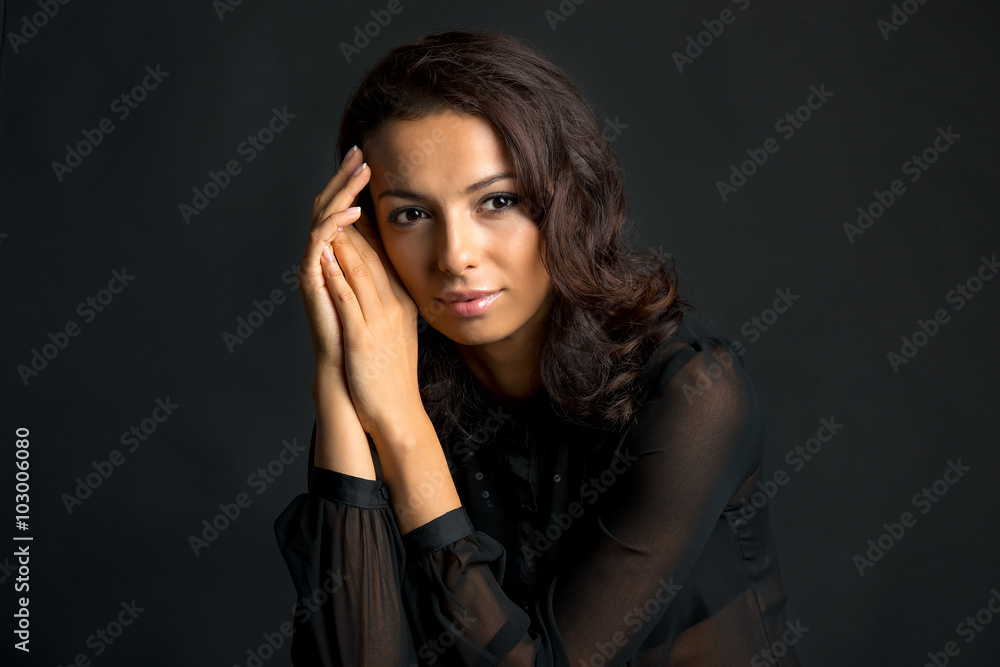 Closeup portrait of a fashion model posing at studio Closeup portrait of a fashion model posing at studio