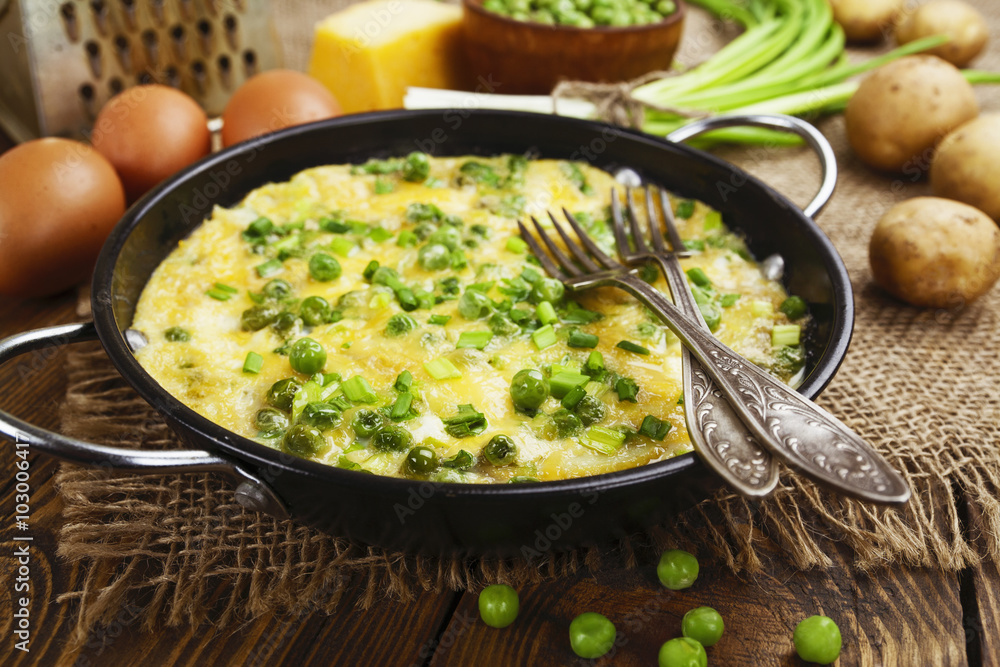 Omelette with green peas, potatoes and cheese Omelette with green peas, potatoes and cheese