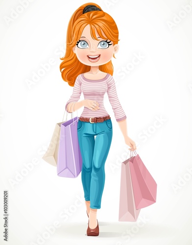 Cute redhead shopaholic girl goes with paper bags in hands isolated on a white background