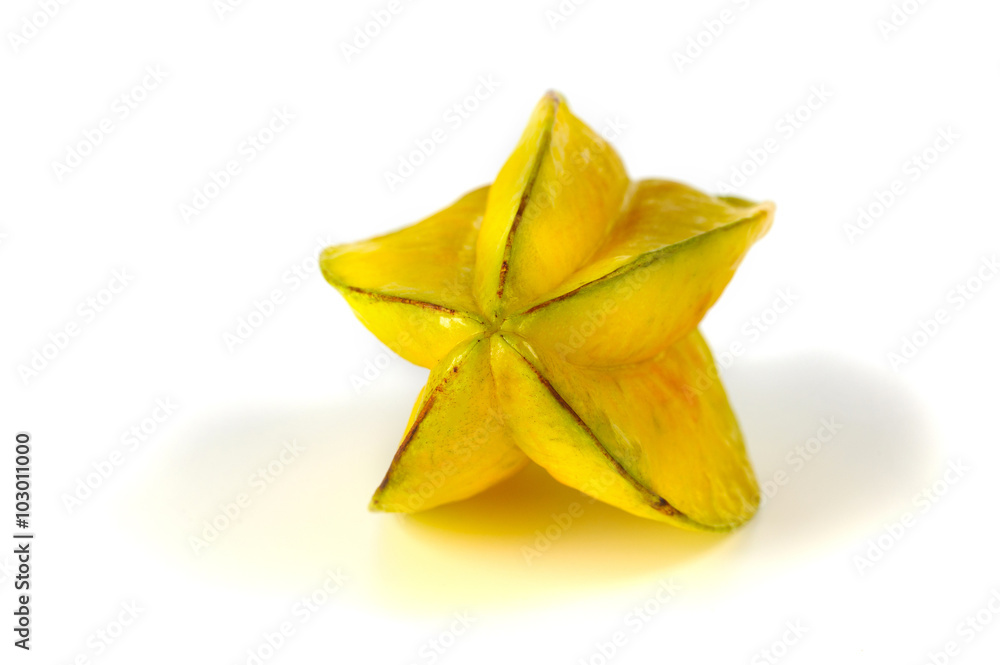 Close up view of carambola on the white Close up view of carambola on the white