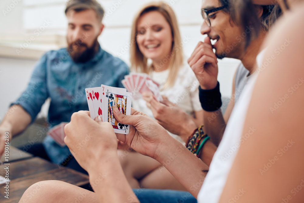 Group of friends playing card Group of friends playing card