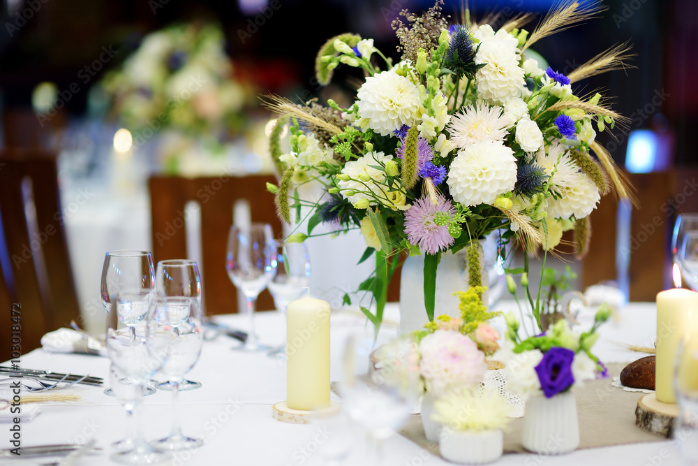 Beautiful table set for some festive event or wedding reception Beautiful table set for some festive event or wedding reception
