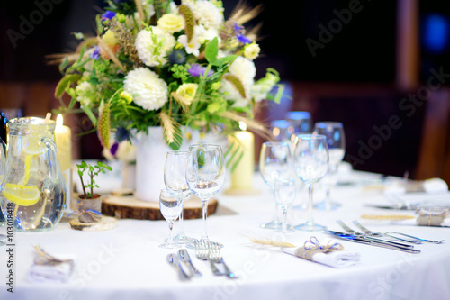 Beautiful table set for some festive event or wedding reception © MNStudio