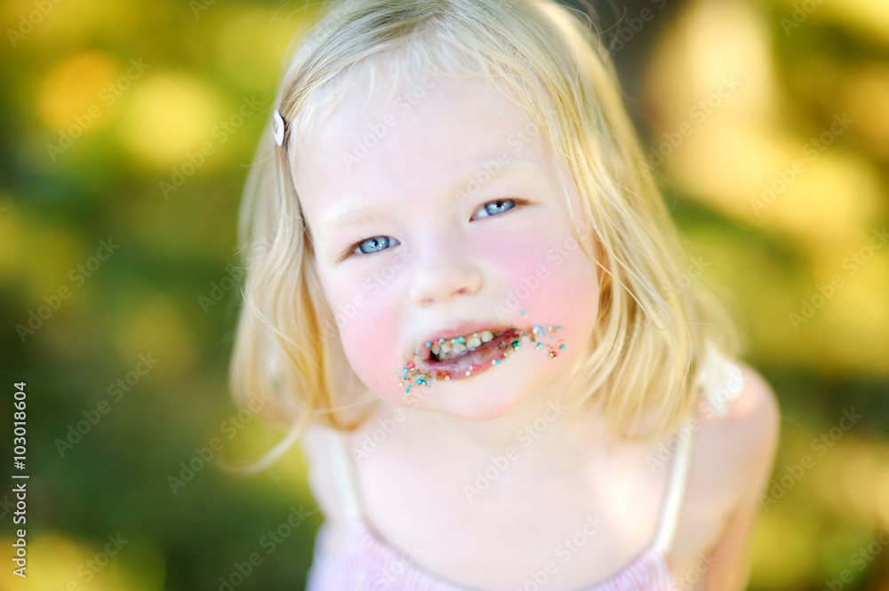 Sweet little girl with messy face Sweet little girl with messy face