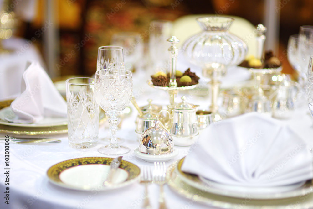 Beautiful table set for some festive event or wedding reception Beautiful table set for some festive event or wedding reception